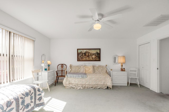 446 Marion Dr, Niceville, FL 32578 - carpeted bedroom with visible vents and a ceiling fan