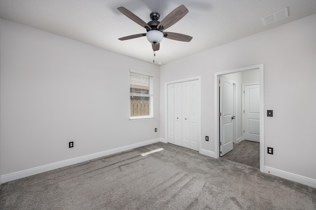 367 Brighton Cv, Freeport, FL 32439 - unfurnished bedroom featuring baseboards, carpet flooring, visible vents, and a closet