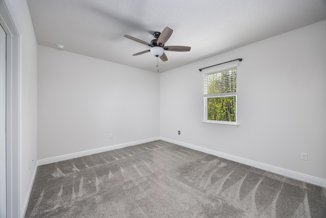 367 Brighton Cv, Freeport, FL 32439 - carpeted empty room featuring a ceiling fan and baseboards