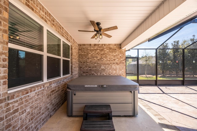 367 Brighton Cv, Freeport, FL 32439 - view of patio with a hot tub, ceiling fan, fence, and glass enclosure