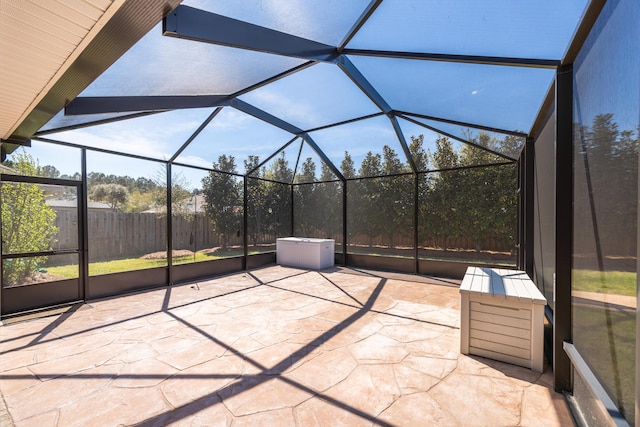 367 Brighton Cv, Freeport, FL 32439 - view of patio with fence and a lanai
