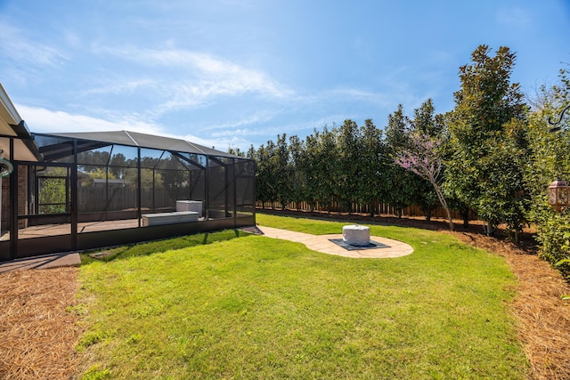 367 Brighton Cv, Freeport, FL 32439 - view of yard featuring a swimming pool, a fenced backyard, glass enclosure, and a patio