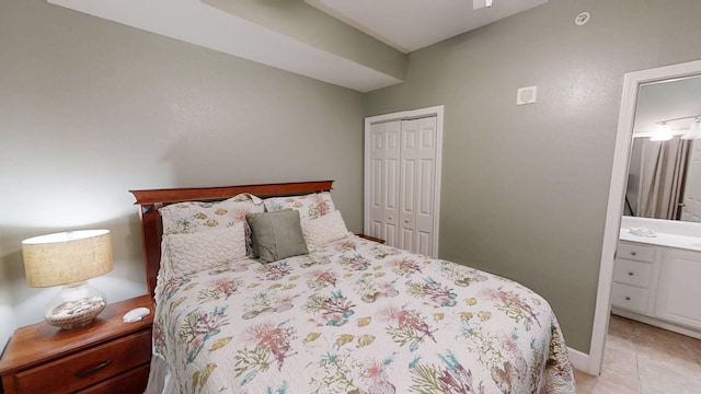 16819 Front Beach Rd Unit 210, Panama City Beach, FL 32413 - bedroom featuring a closet and light tile patterned flooring