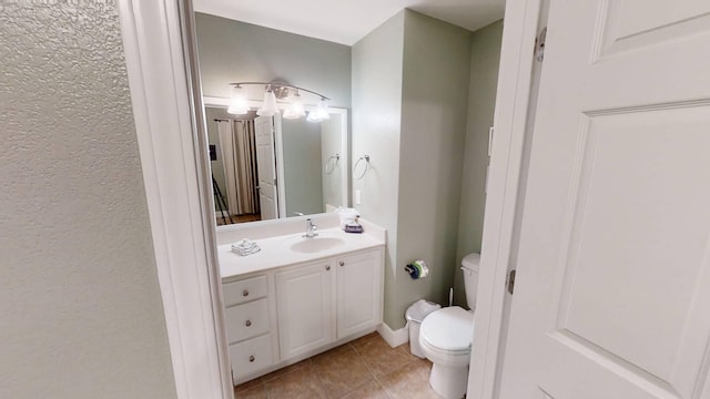 16819 Front Beach Rd Unit 210, Panama City Beach, FL 32413 - bathroom with toilet, tile patterned flooring, and vanity