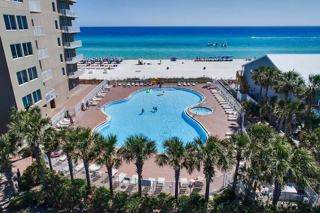 16819 Front Beach Rd Unit 210, Panama City Beach, FL 32413 - bird's eye view of a pool and a nearby body of water