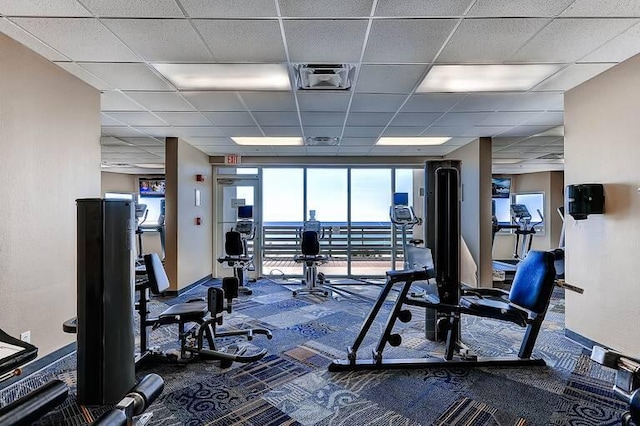 16819 Front Beach Rd Unit 210, Panama City Beach, FL 32413 - workout area with carpet floors and a paneled ceiling