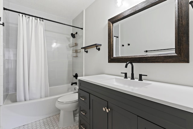 full bathroom with tile patterned flooring, toilet, vanity, and shower / bath combination with curtain