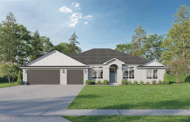 6676 Redfield St, Navarre, FL 32566 - view of front of property featuring concrete driveway, a front yard, an attached garage, and board and batten siding