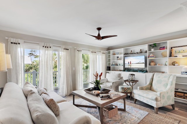 2381 W County Highway 30a Unit 8, Santa Rosa Beach, FL 32459 - living area with ornamental molding, ceiling fan, and wood finished floors