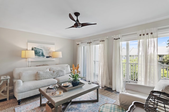 2381 W County Highway 30a Unit 8, Santa Rosa Beach, FL 32459 - living area featuring a ceiling fan, healthy amount of natural light, ornamental molding, and wood finished floors
