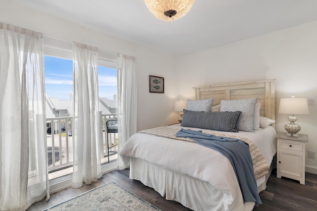 2381 W County Highway 30a Unit 8, Santa Rosa Beach, FL 32459 - bedroom featuring access to outside and dark wood-type flooring