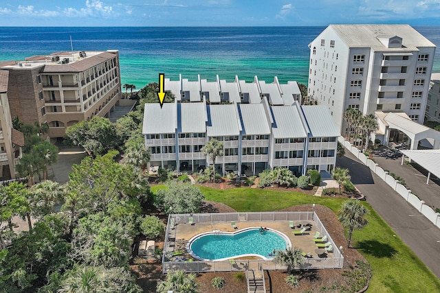 2381 W County Highway 30a Unit 8, Santa Rosa Beach, FL 32459 - drone / aerial view of a pool area and a nearby body of water