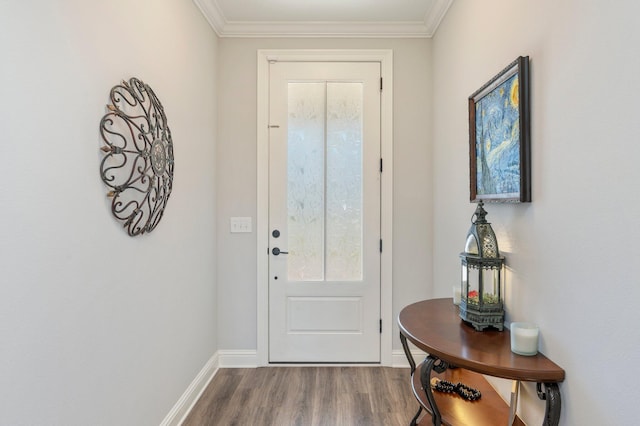 entryway with baseboards, wood finished floors, and crown molding