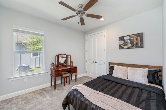 bedroom featuring baseboards, carpet, and ceiling fan
