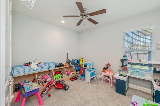 recreation room with carpet flooring, recessed lighting, baseboards, and ceiling fan