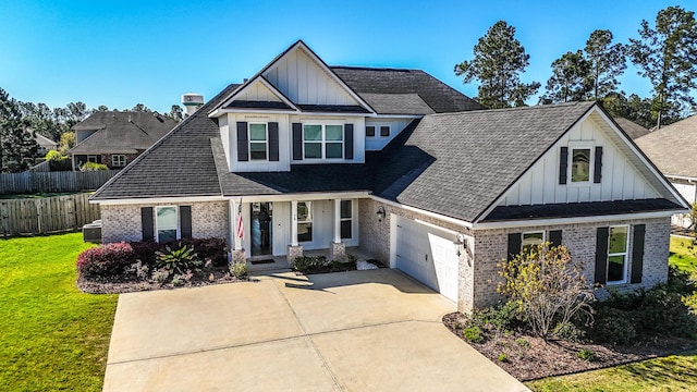 view of front of home with brick siding, board and batten siding, a front lawn, and fence
