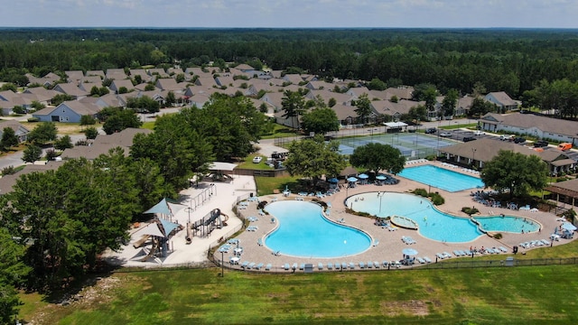 bird's eye view with a forest view and a residential view