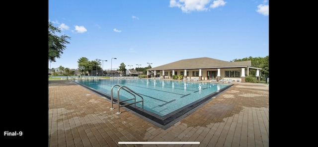 pool featuring a patio area