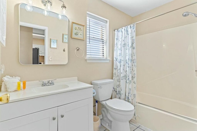 bathroom with vanity, shower / bath combination with curtain, and toilet