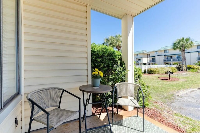 balcony with a patio and a residential view