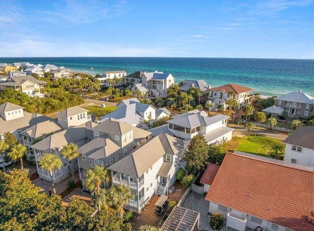 bird's eye view with a water view and a residential view