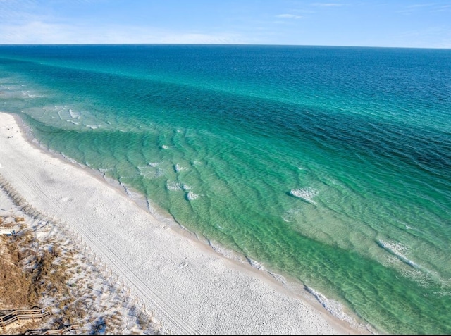 aerial view featuring a beach view and a water view
