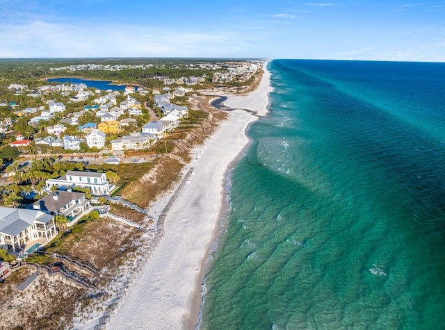 aerial view with a beach view and a water view