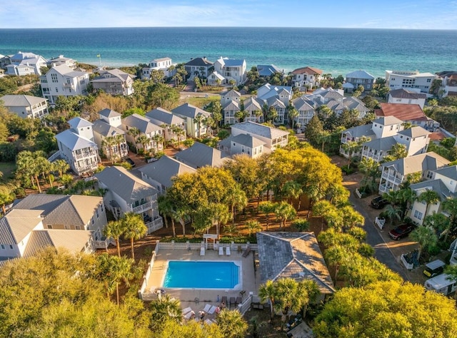bird's eye view with a residential view and a water view