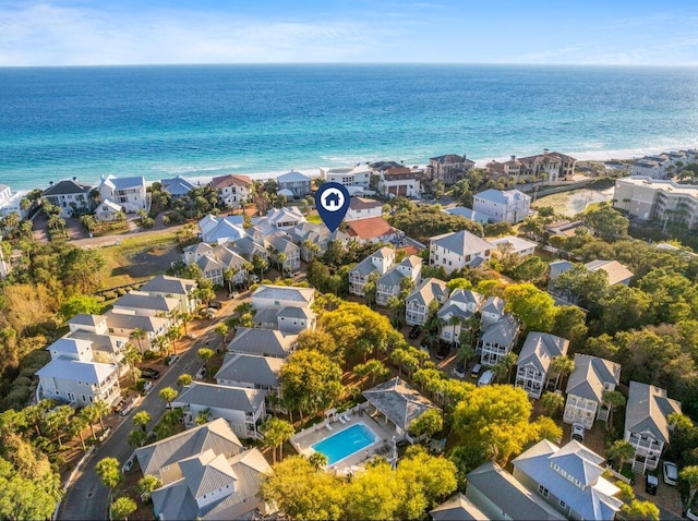 birds eye view of property with a residential view and a water view