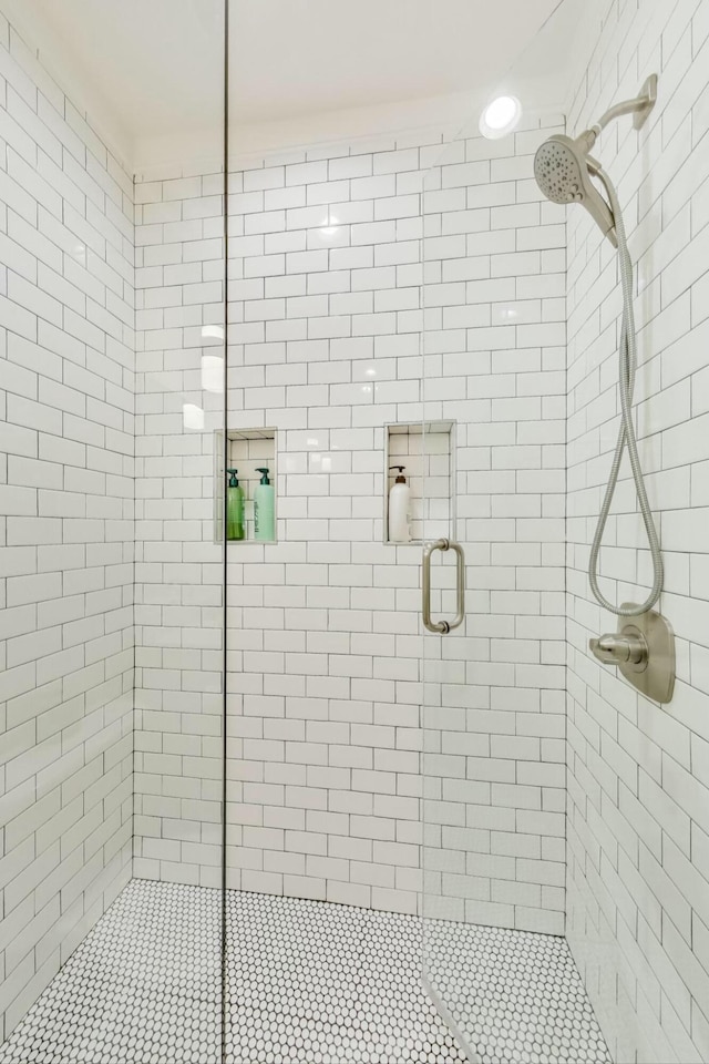 full bathroom with a shower stall