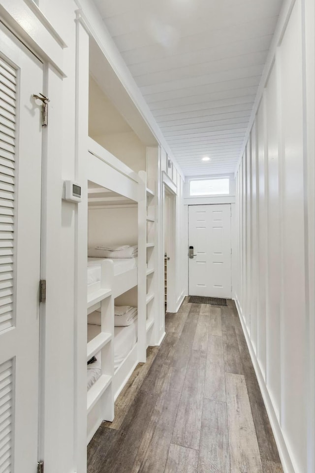 hallway featuring hardwood / wood-style flooring
