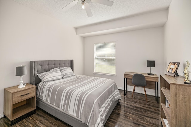 bedroom featuring a textured ceiling, baseboards, a ceiling fan, and dark wood finished floors
