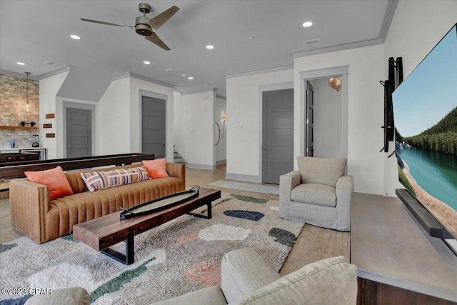 8320 Surf Dr, Panama City Beach, FL 32408 - living room featuring a ceiling fan, crown molding, and recessed lighting
