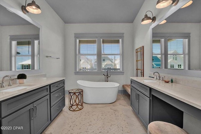 8320 Surf Dr, Panama City Beach, FL 32408 - bathroom with two vanities, marble finish floor, and a sink