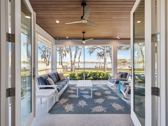 sunroom / solarium featuring wood ceiling, recessed lighting, an outdoor living space, and ceiling fan