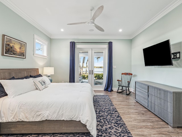 bedroom featuring french doors, ornamental molding, baseboards, access to outside, and light wood-style flooring