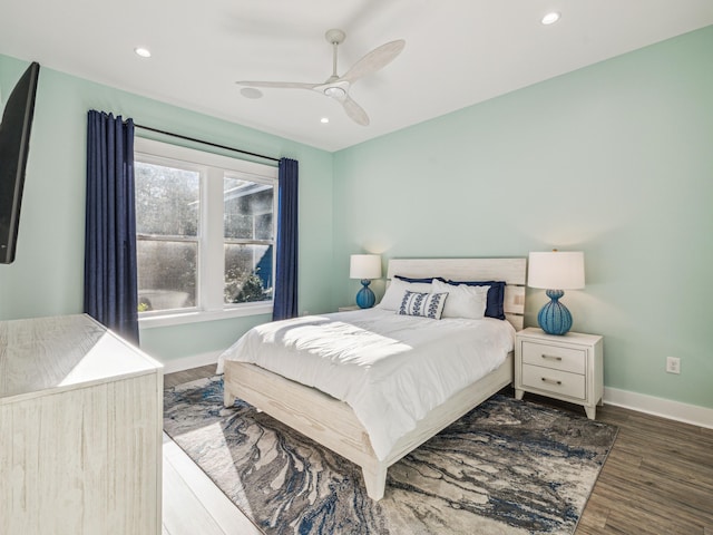 bedroom with baseboards, wood finished floors, recessed lighting, and a ceiling fan