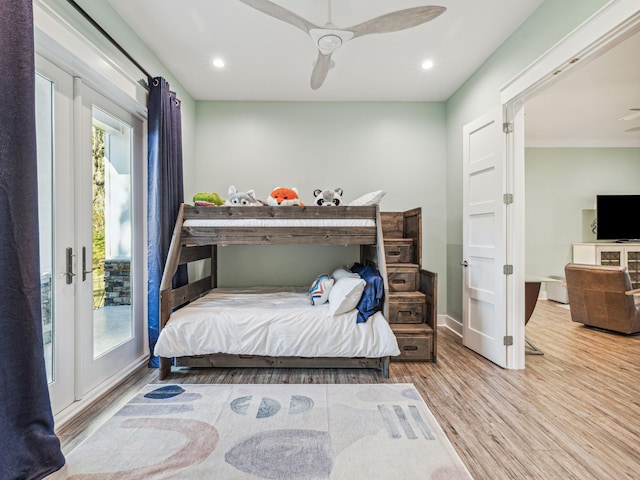 bedroom with a ceiling fan, recessed lighting, baseboards, and wood finished floors