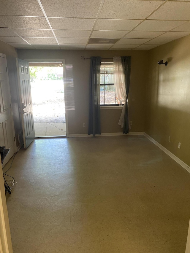 3139 Live Oak St, Navarre, FL 32566 - unfurnished room with baseboards and a drop ceiling