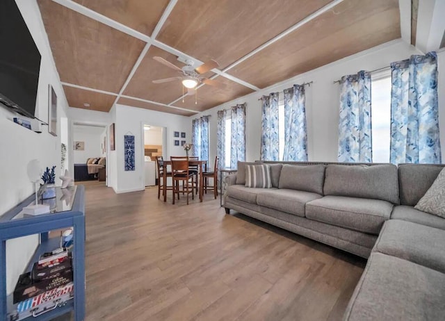 living room featuring wood finished floors and ceiling fan