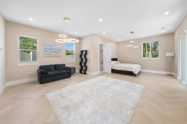 bedroom with recessed lighting, baseboards, and an inviting chandelier