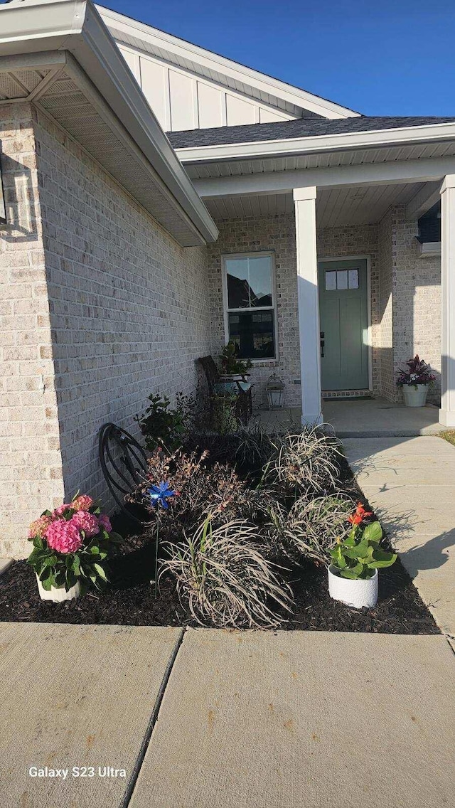3784 Redbud Way, Panama City, FL 32404 - view of exterior entry with covered porch and brick siding