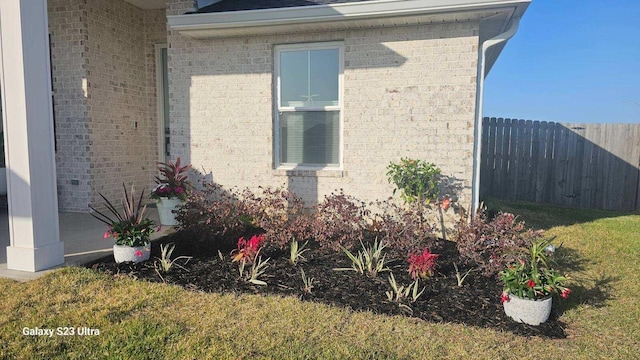 3784 Redbud Way, Panama City, FL 32404 - view of property exterior featuring fence and brick siding