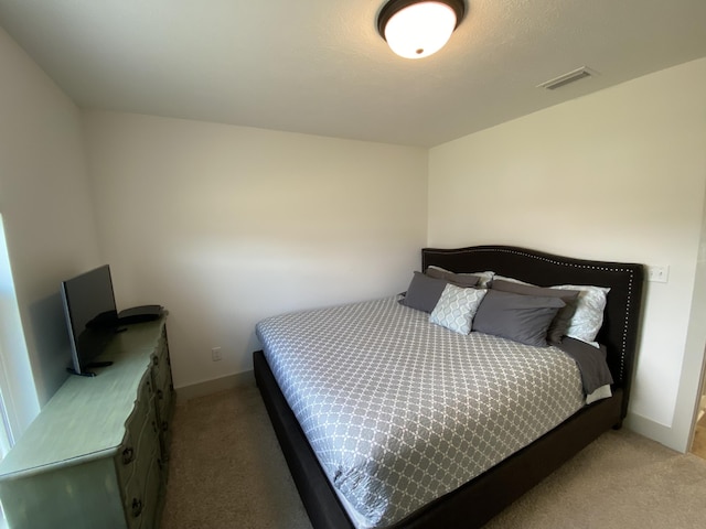 3784 Redbud Way, Panama City, FL 32404 - bedroom featuring baseboards, visible vents, and light carpet
