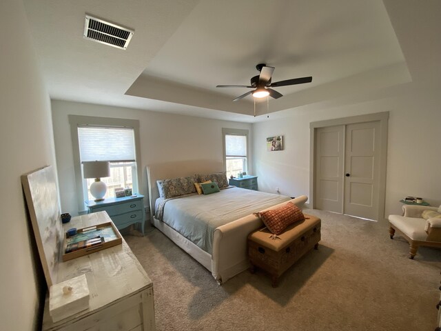 3784 Redbud Way, Panama City, FL 32404 - bedroom featuring visible vents, a ceiling fan, carpet, and a raised ceiling