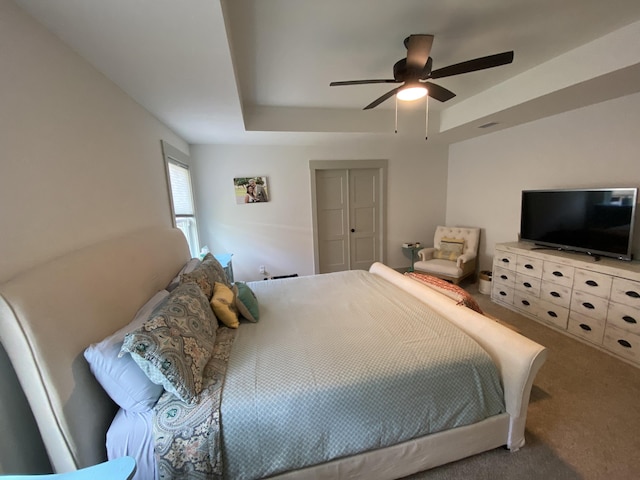 3784 Redbud Way, Panama City, FL 32404 - carpeted bedroom featuring ceiling fan and a raised ceiling