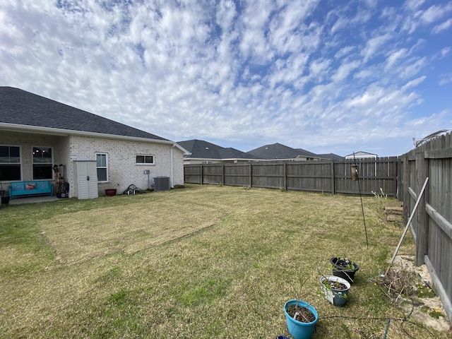 3784 Redbud Way, Panama City, FL 32404 - view of yard featuring a fenced backyard and central AC