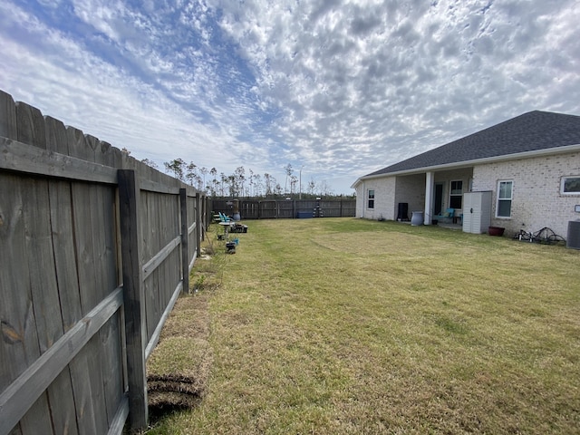 3784 Redbud Way, Panama City, FL 32404 - view of yard featuring a fenced backyard and central AC
