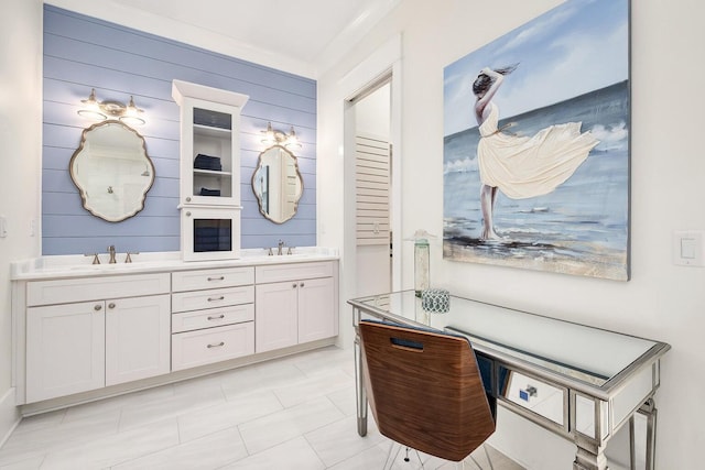 bathroom with double vanity and a sink
