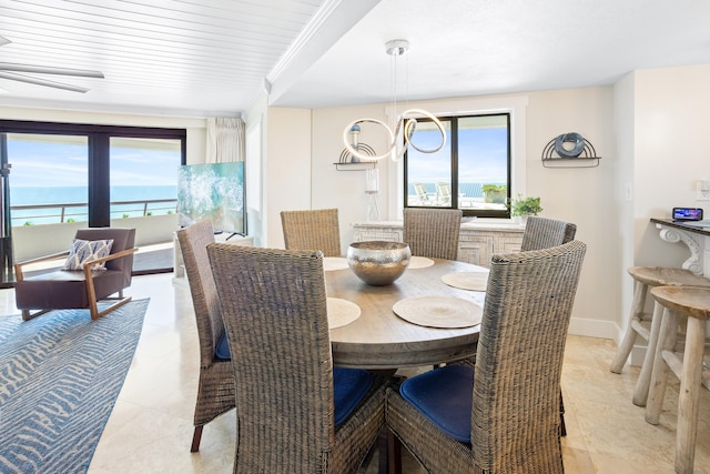 291 Scenic Gulf Dr Unit 1405, Miramar Beach, FL 32550 - dining space featuring ornamental molding, light tile patterned floors, baseboards, and ceiling fan